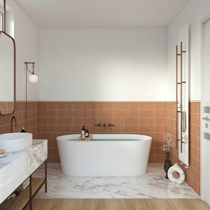 La terre cuite s'installe sur vos murs de salles de bains comme en témoigne cette jolie crédence réalisée en briques de terre cuite de chez Fragmenti Cotto (13x98mm).